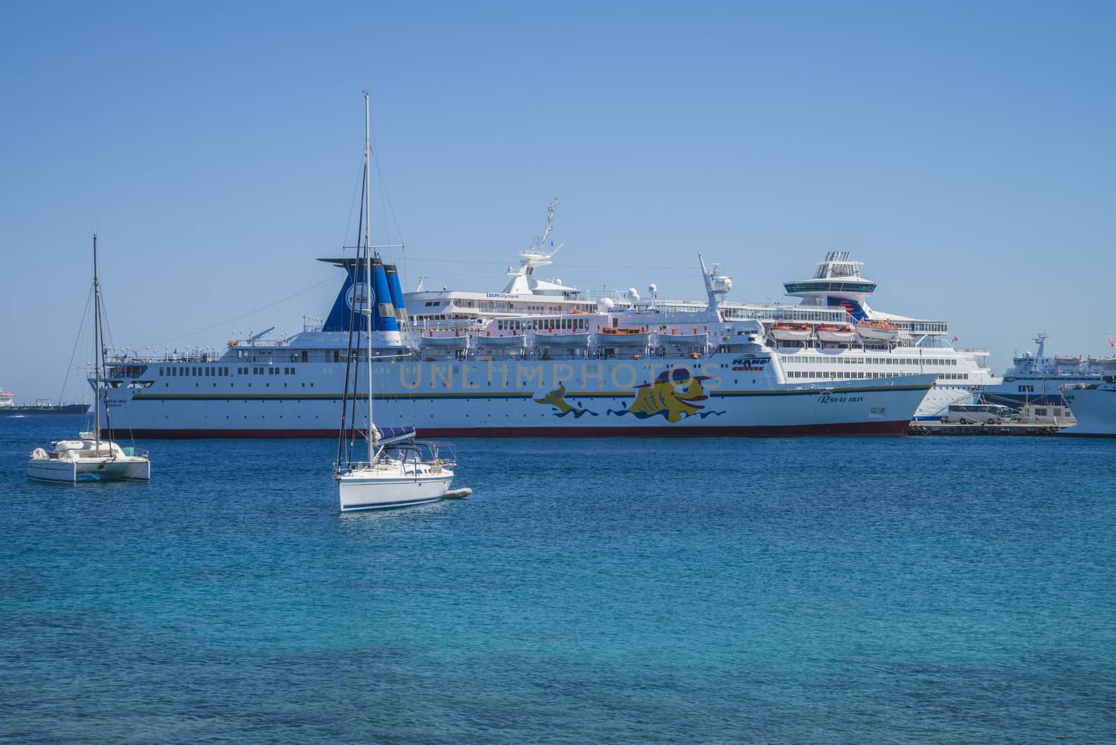 cruise ship in mandraki harbour by steirus