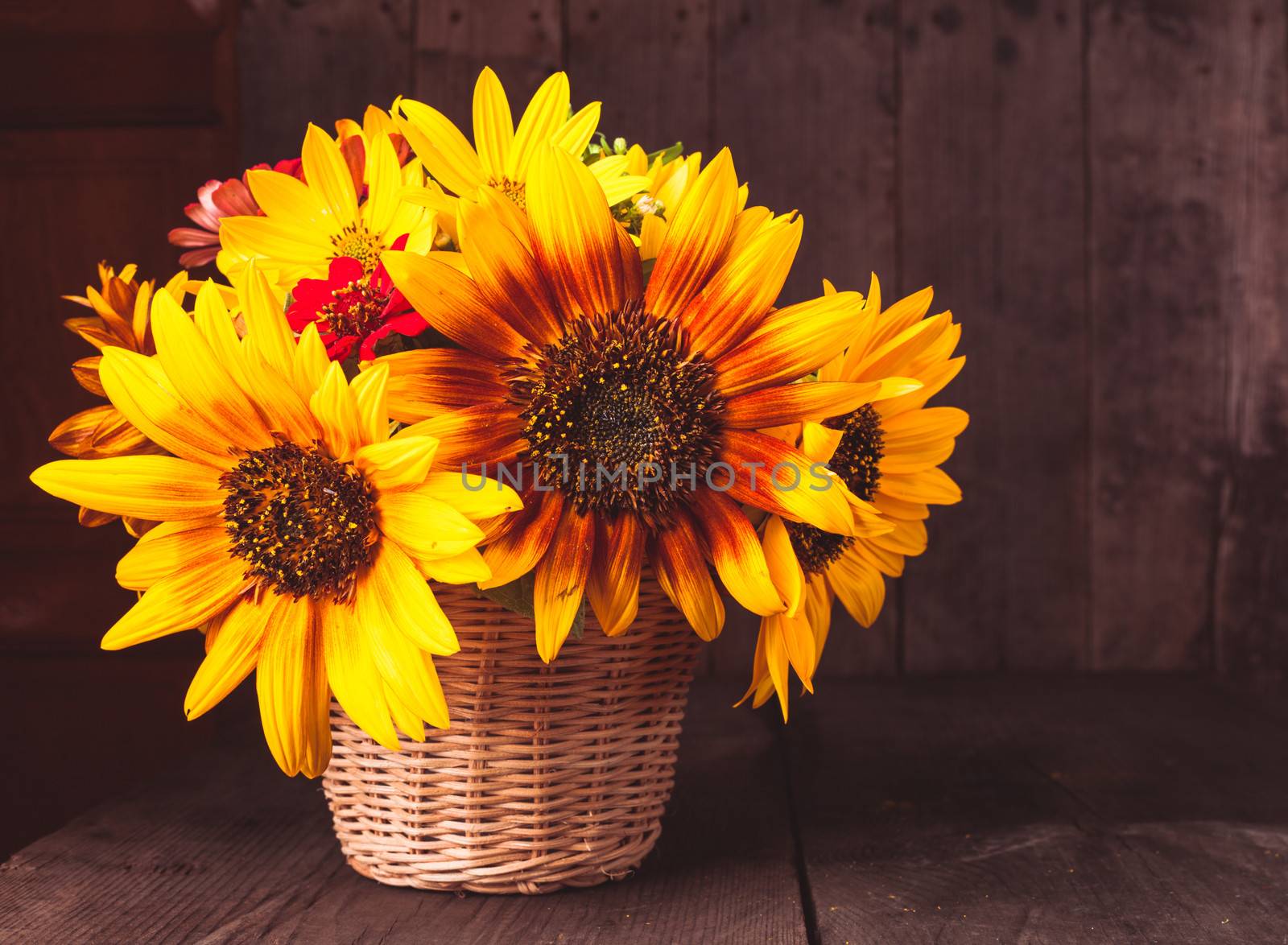 sunflowers in basket by oksix
