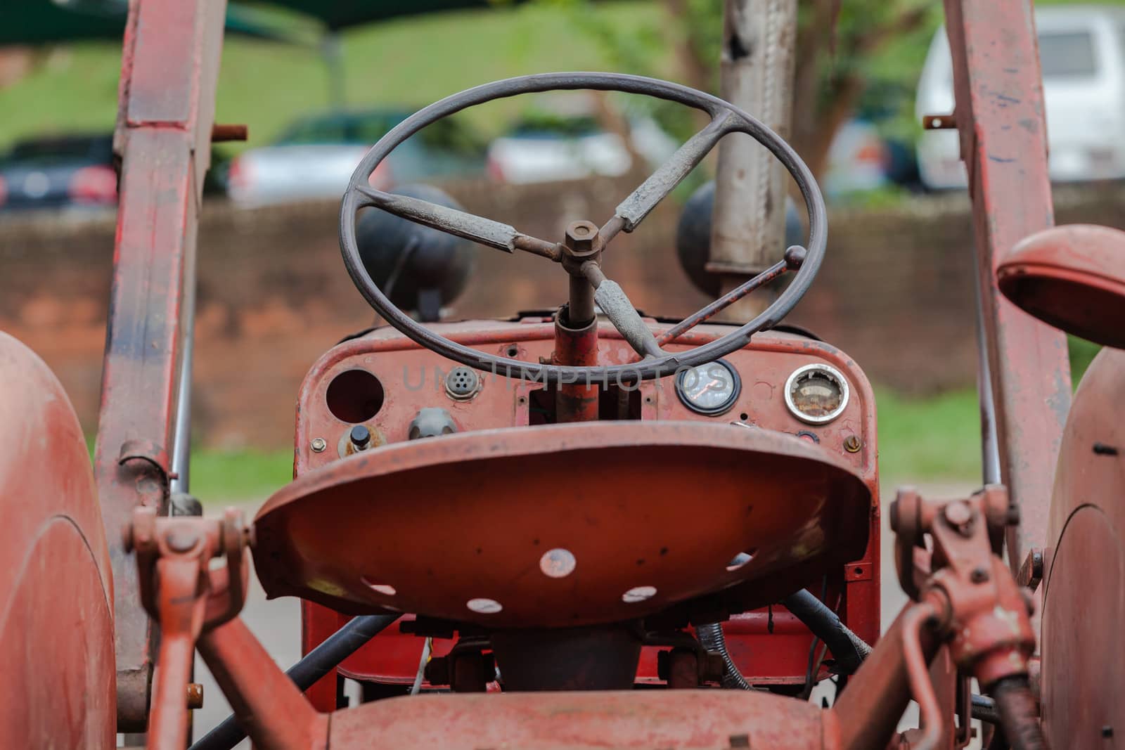 Tractor manufactured  1970's still working in agriculture rear angle in close detail