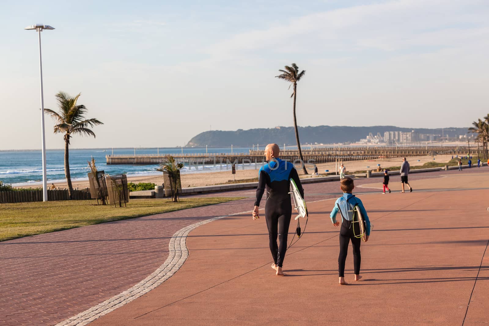 Surfers father and son going surfing at Durban  beach's South-Africa