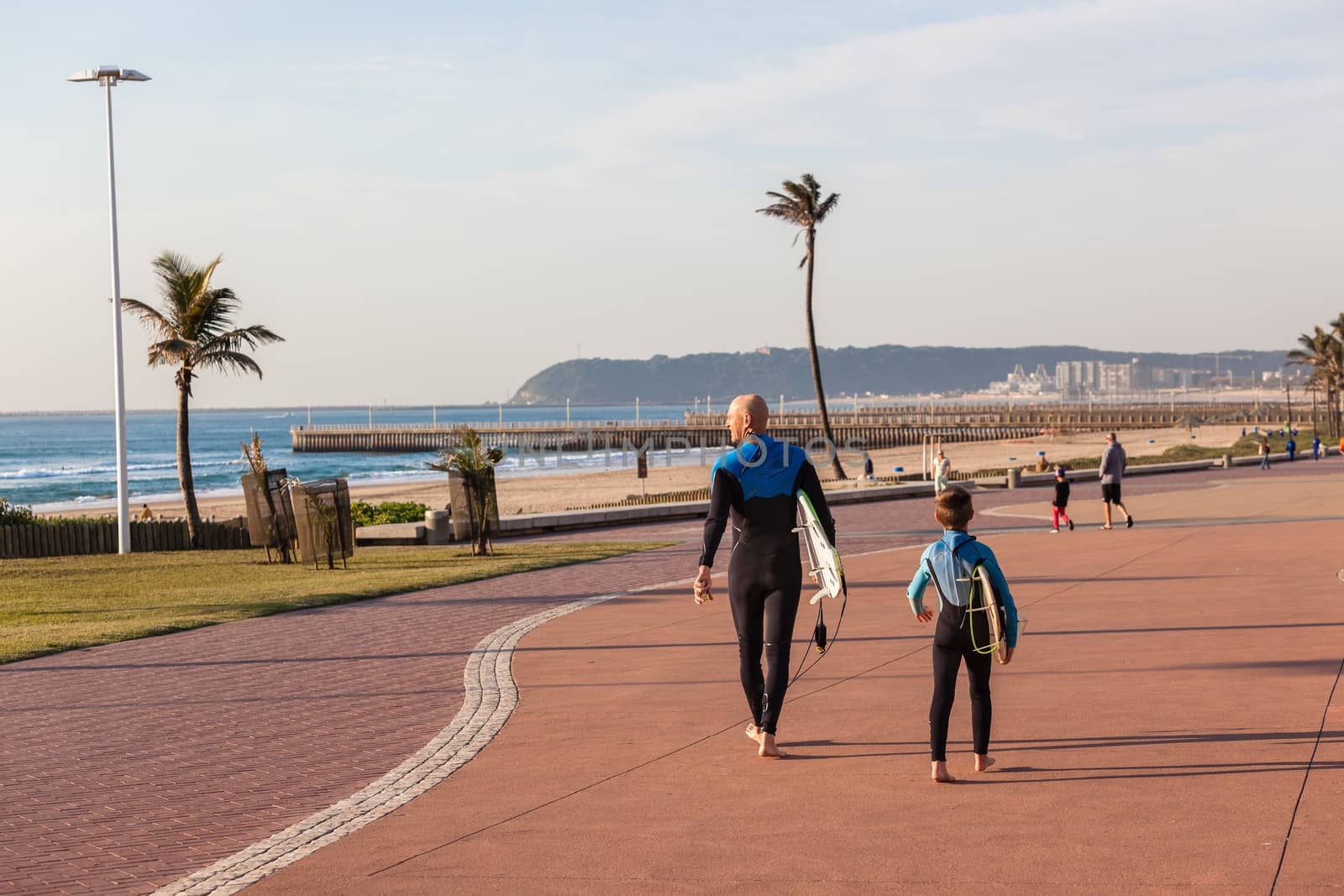 Surfing Father Son by ChrisVanLennepPhoto