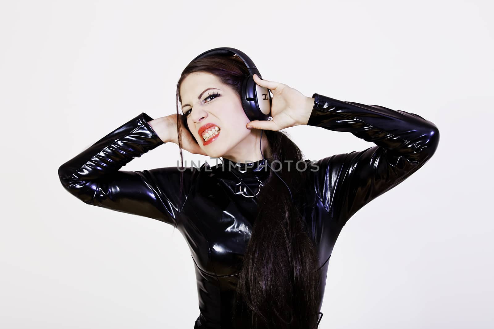 Girl DJ with headphones on her head by dukibu