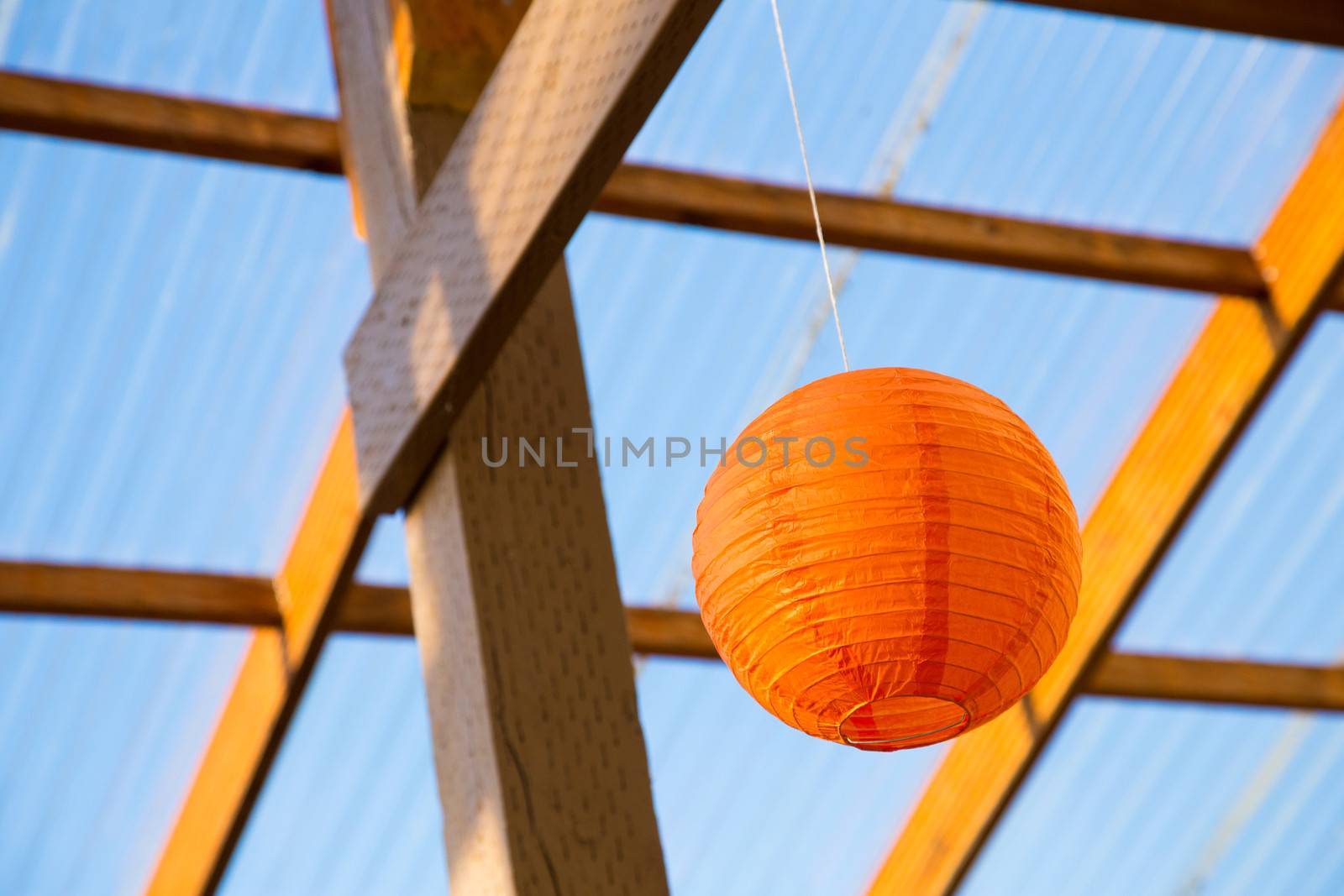Paper Chinese lanterns are used as decorations or decor for this classy wedding reception.