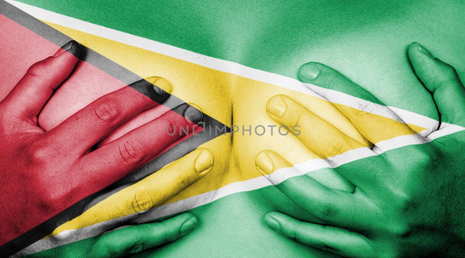 Upper part of female body, hands covering breasts, flag of Guyana