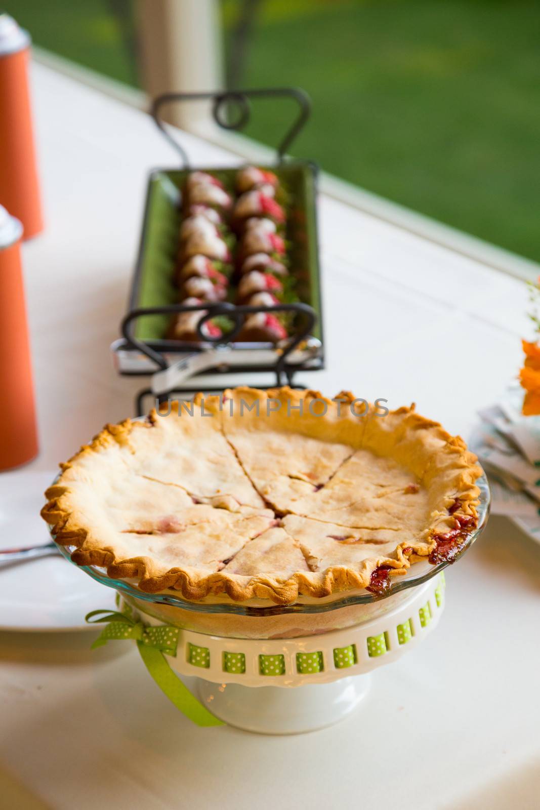 Desserts are prepped and ready at this wedding reception featuring some delicious sweets.