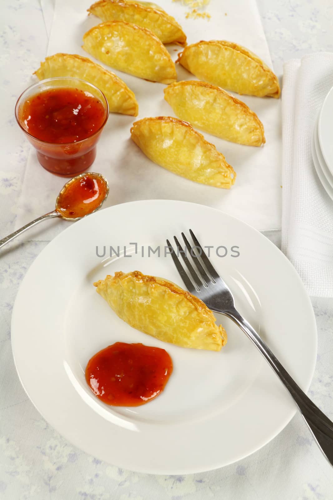 Delicious fresh baked golden pasties with sweet chili relish.