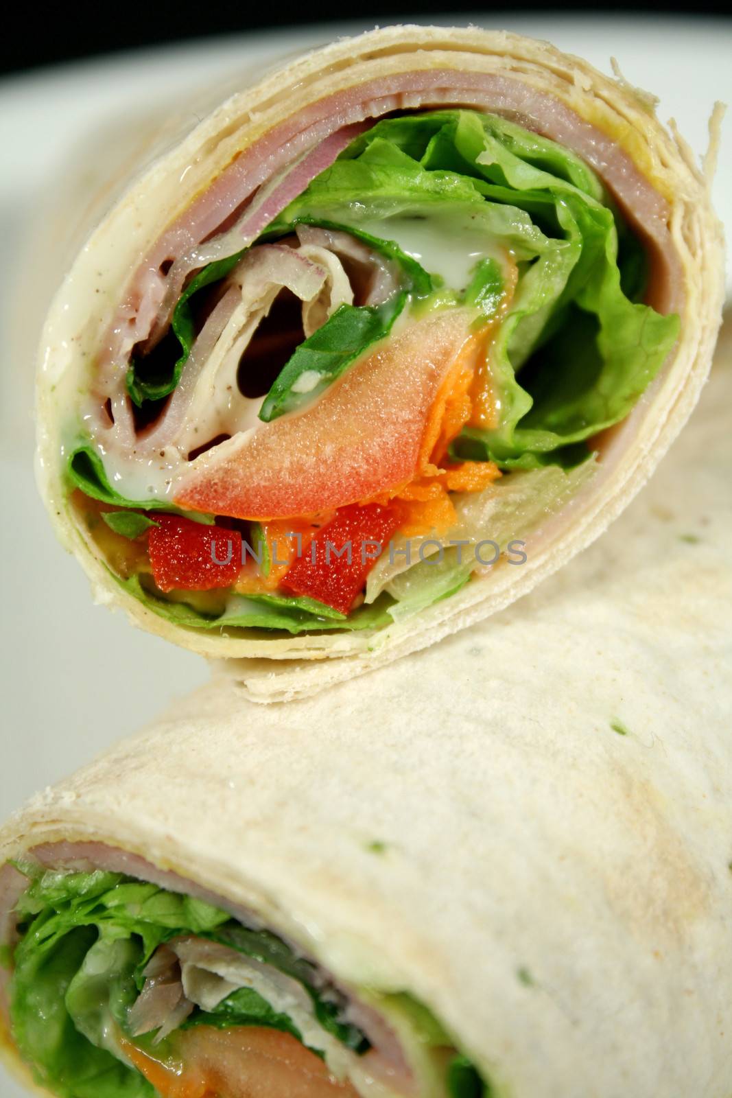 Yummy ham and salad wrap ready to serve.