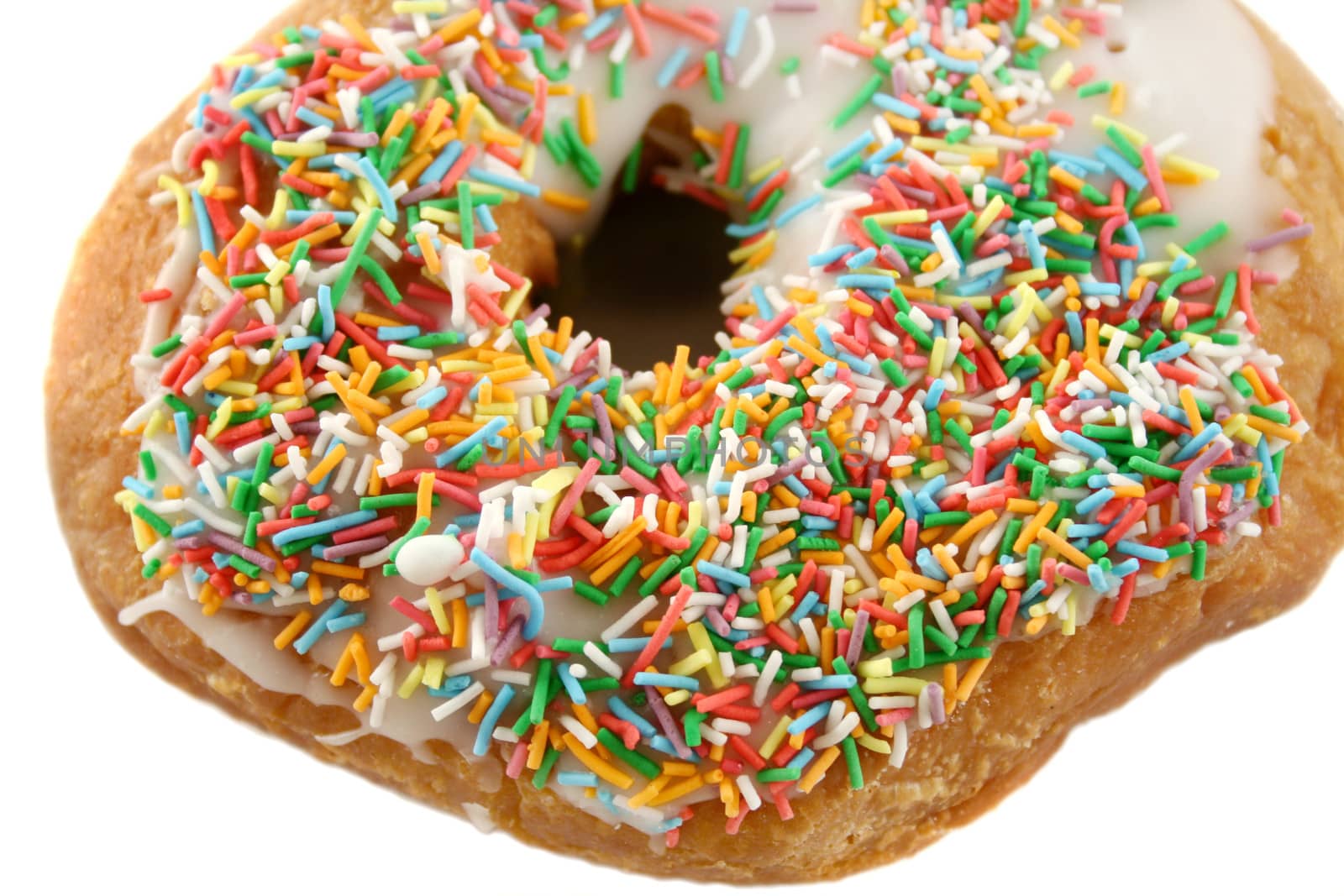 Sweet doughnut covered with colorful hundreds and thousands.