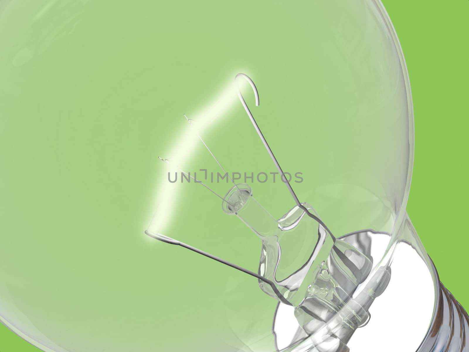 Close up of lightbulb on green background