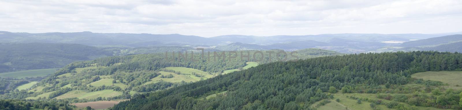 Panorama of landscape in central Germany with forests and fields