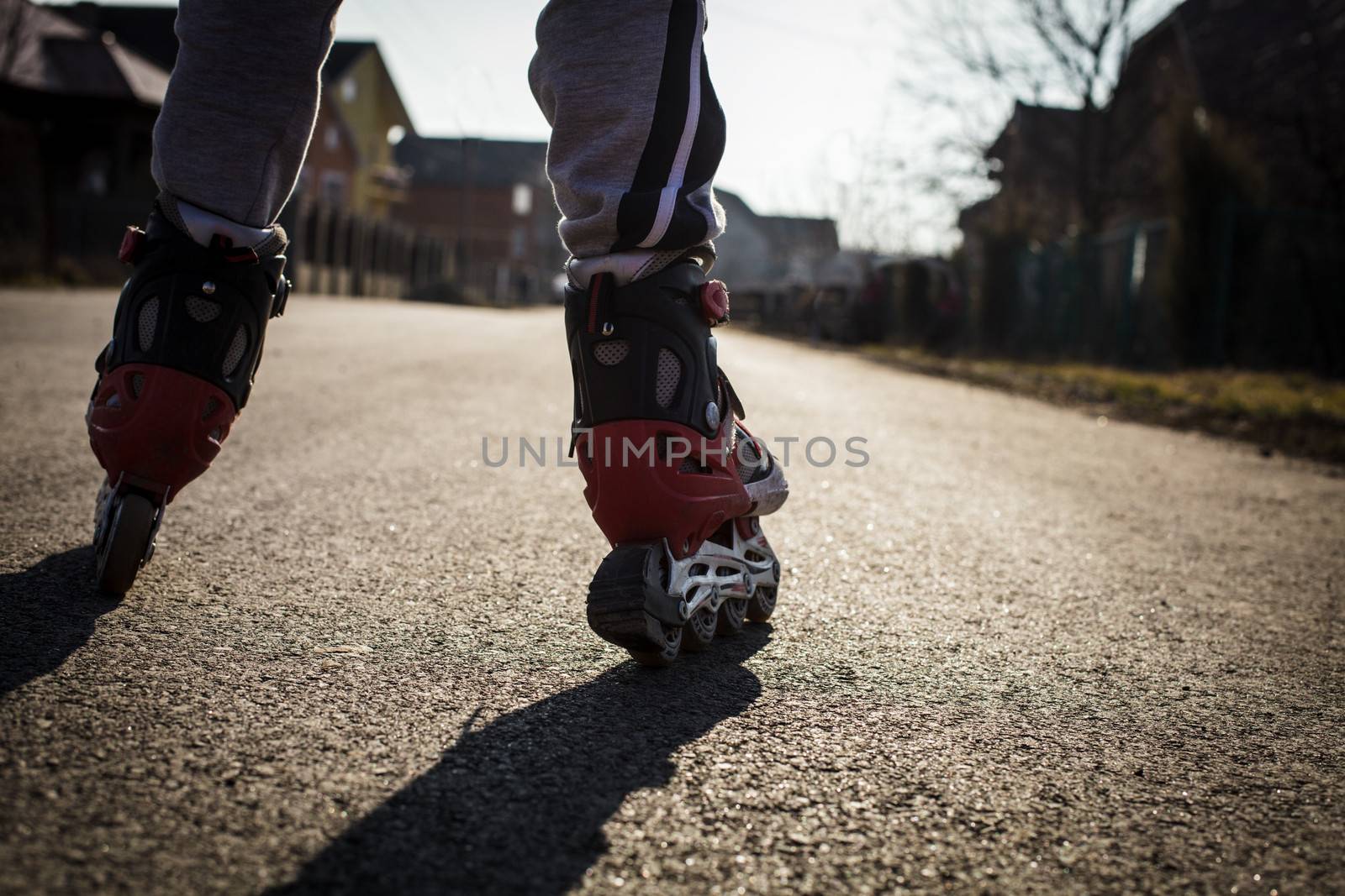 roller skating on the road, close up legs