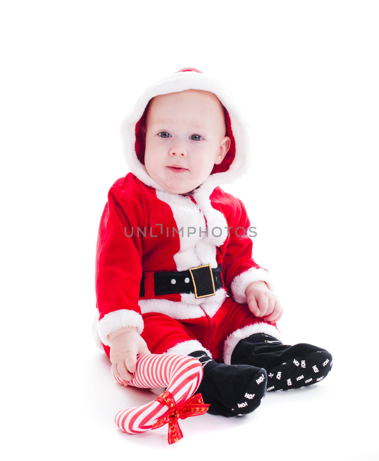 Little Santa boy with  staff isolated on white background