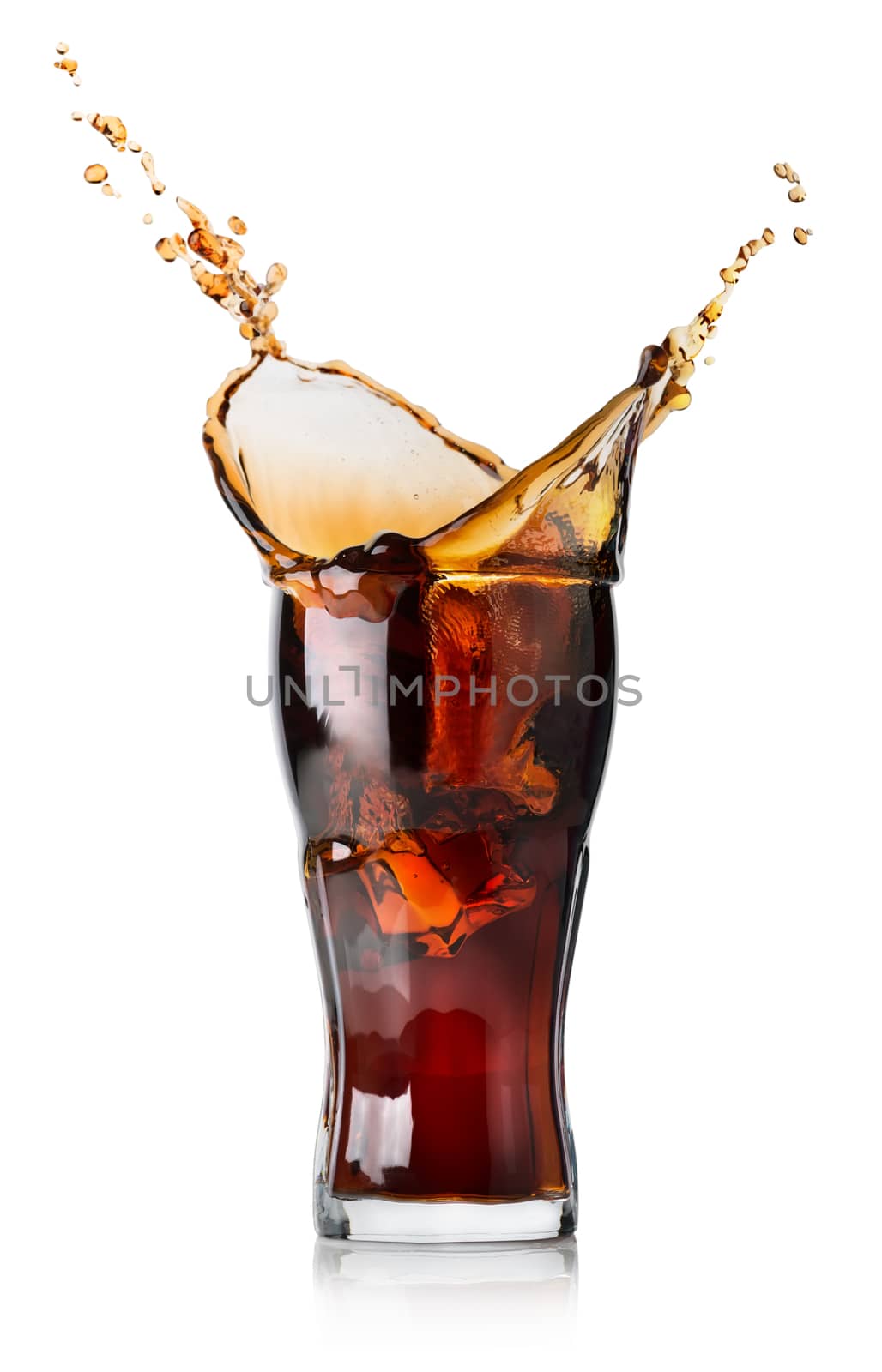 Splash of cola in a glass isolated on a white background