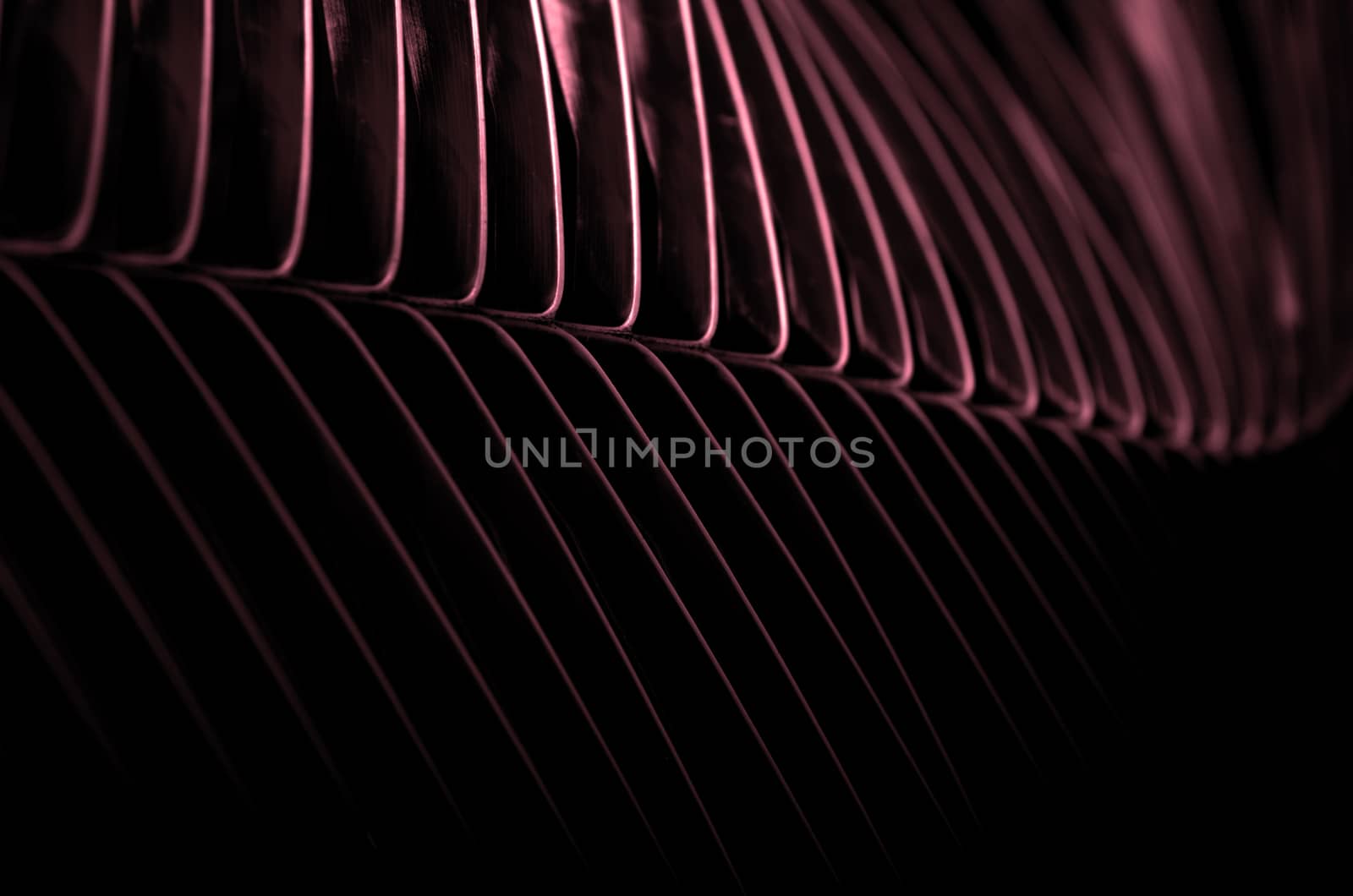 pink abstract nature background of a tropical palm frond