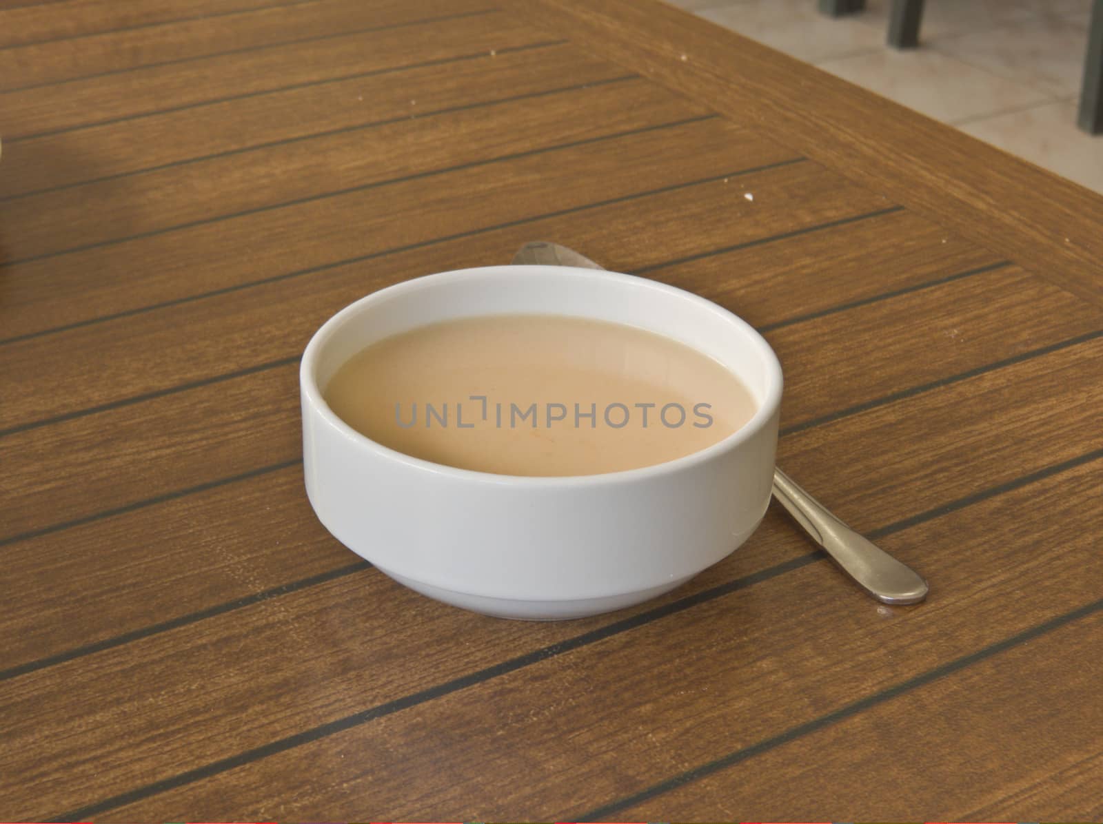 Fragrant chicken soup puree is on the table in a ceramic tea bowls