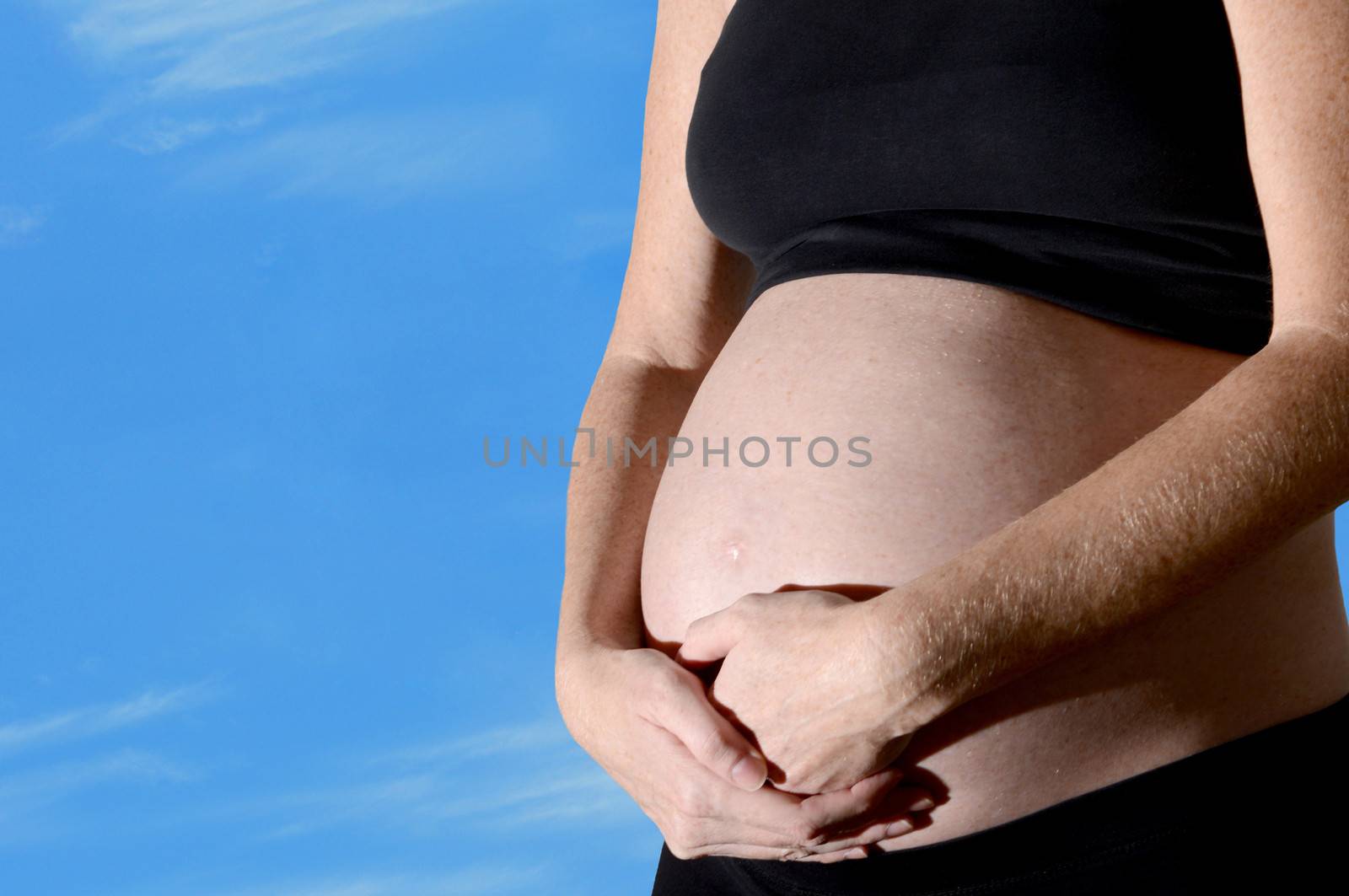 constipation or indigestion and pregnancy on sky background