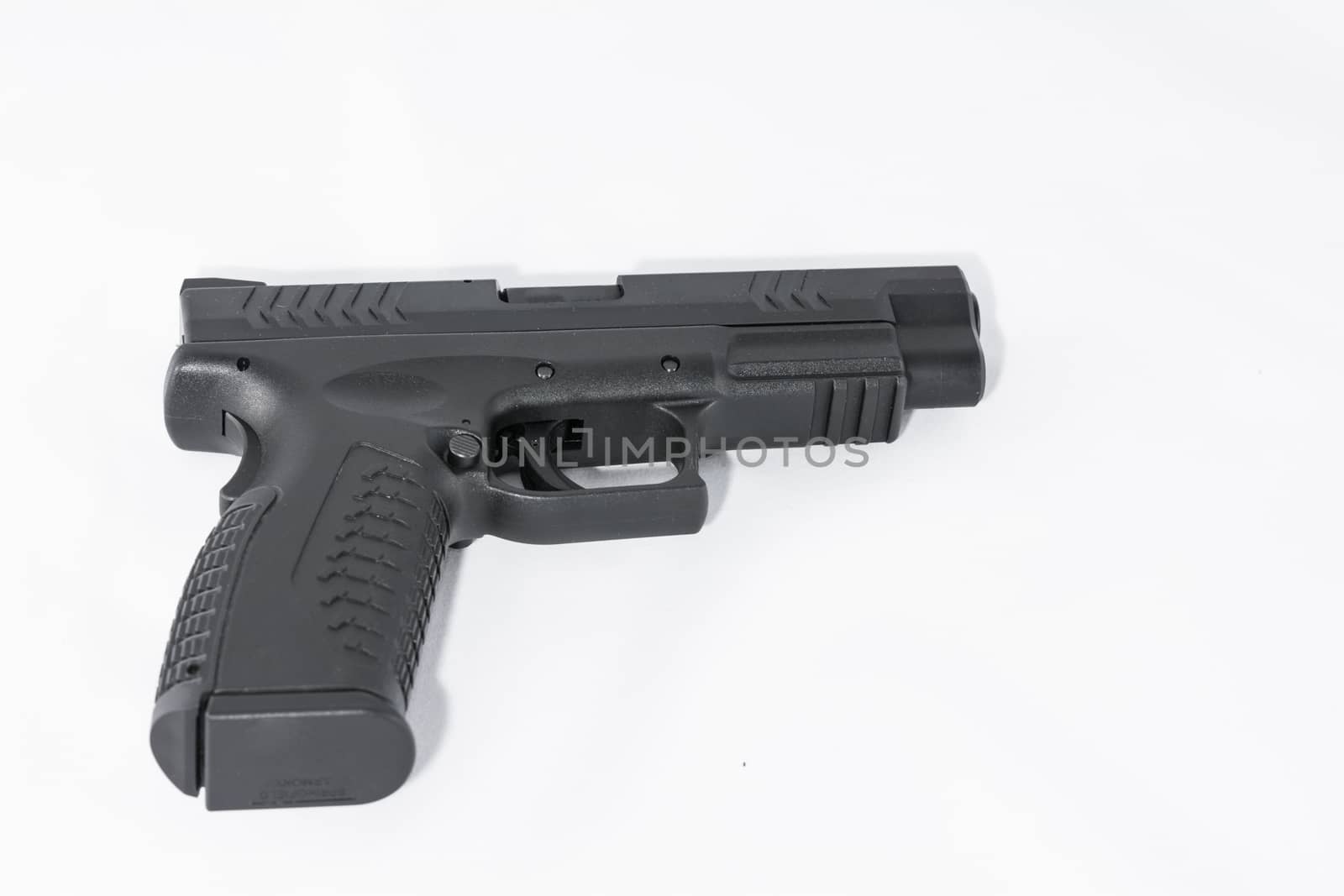Black hand gun on white background with details