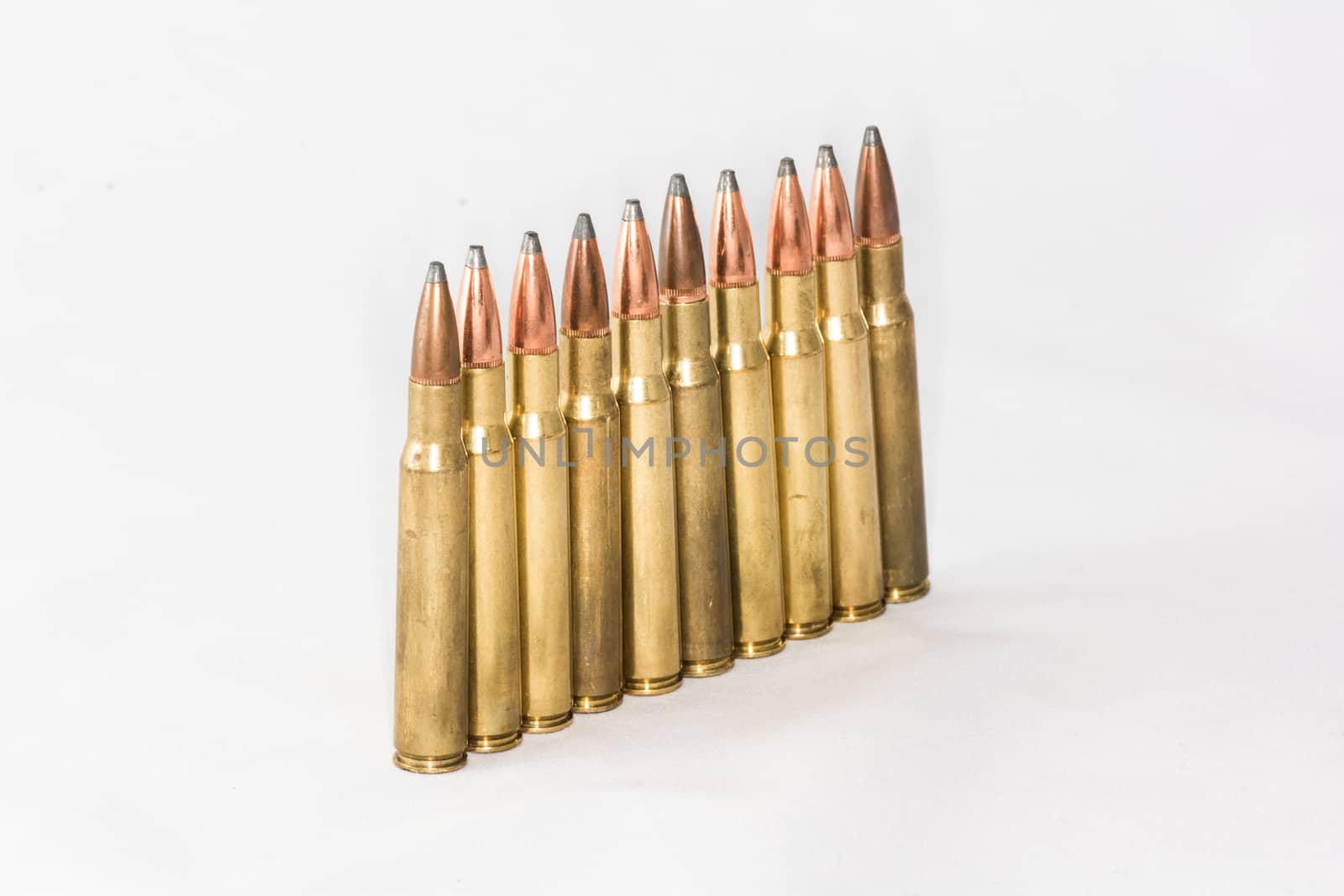 Bullets with white background by IVYPHOTOS