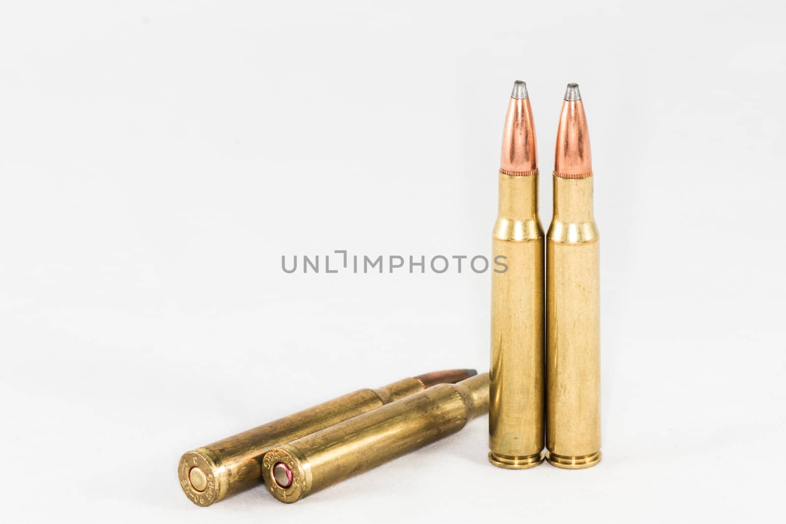 Bullets with white background by IVYPHOTOS