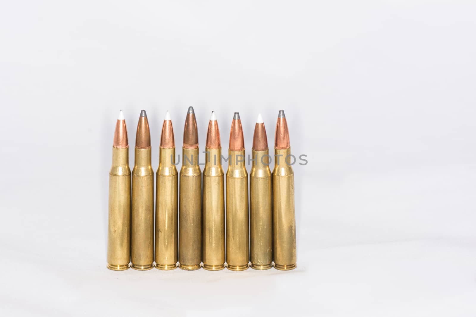 Bullets with white background by IVYPHOTOS