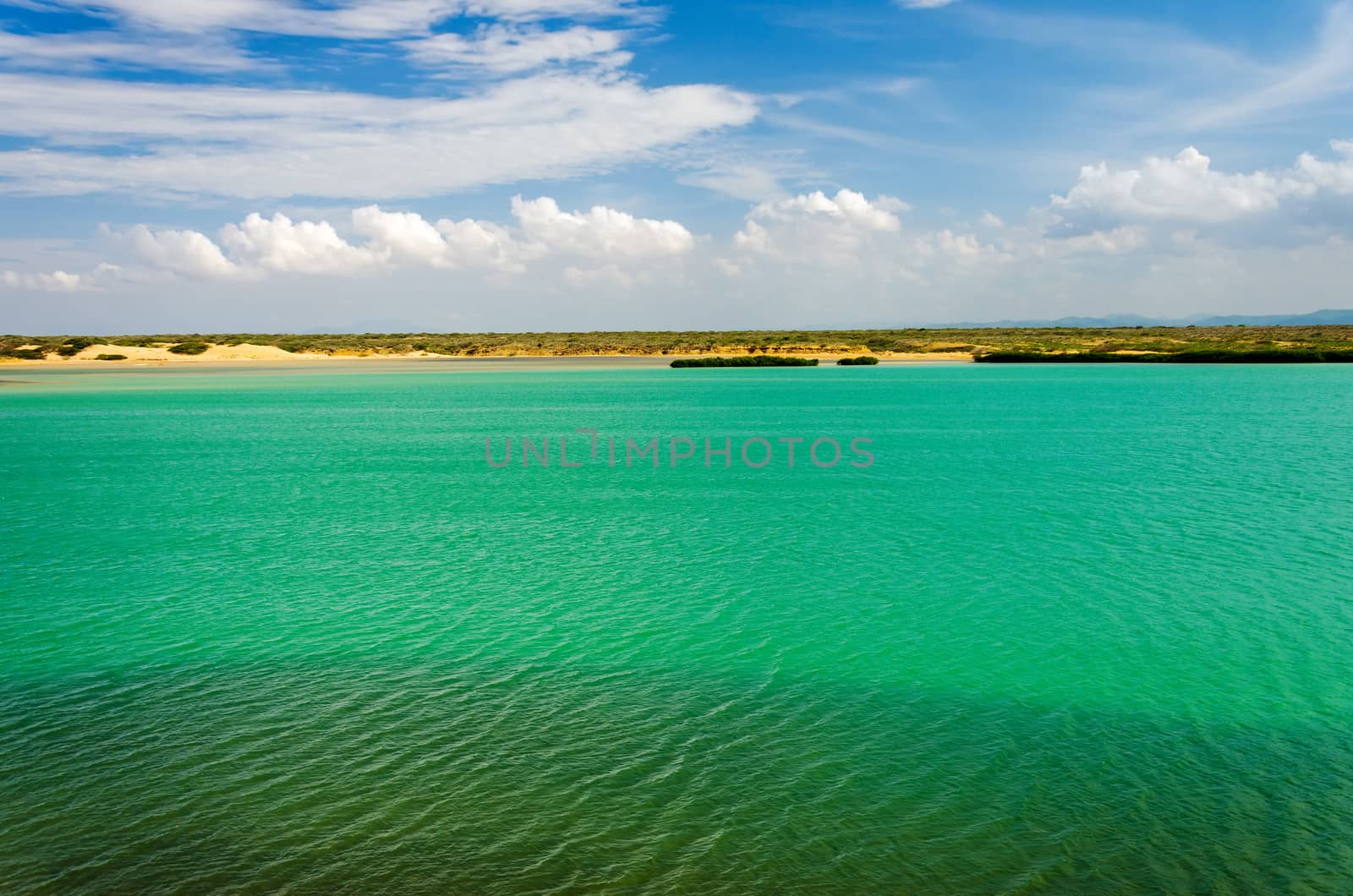 Green sea and blue sky in La Guajira, Colombia