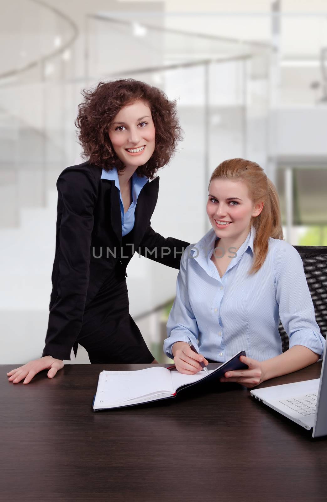 two business woman have a meeting in office