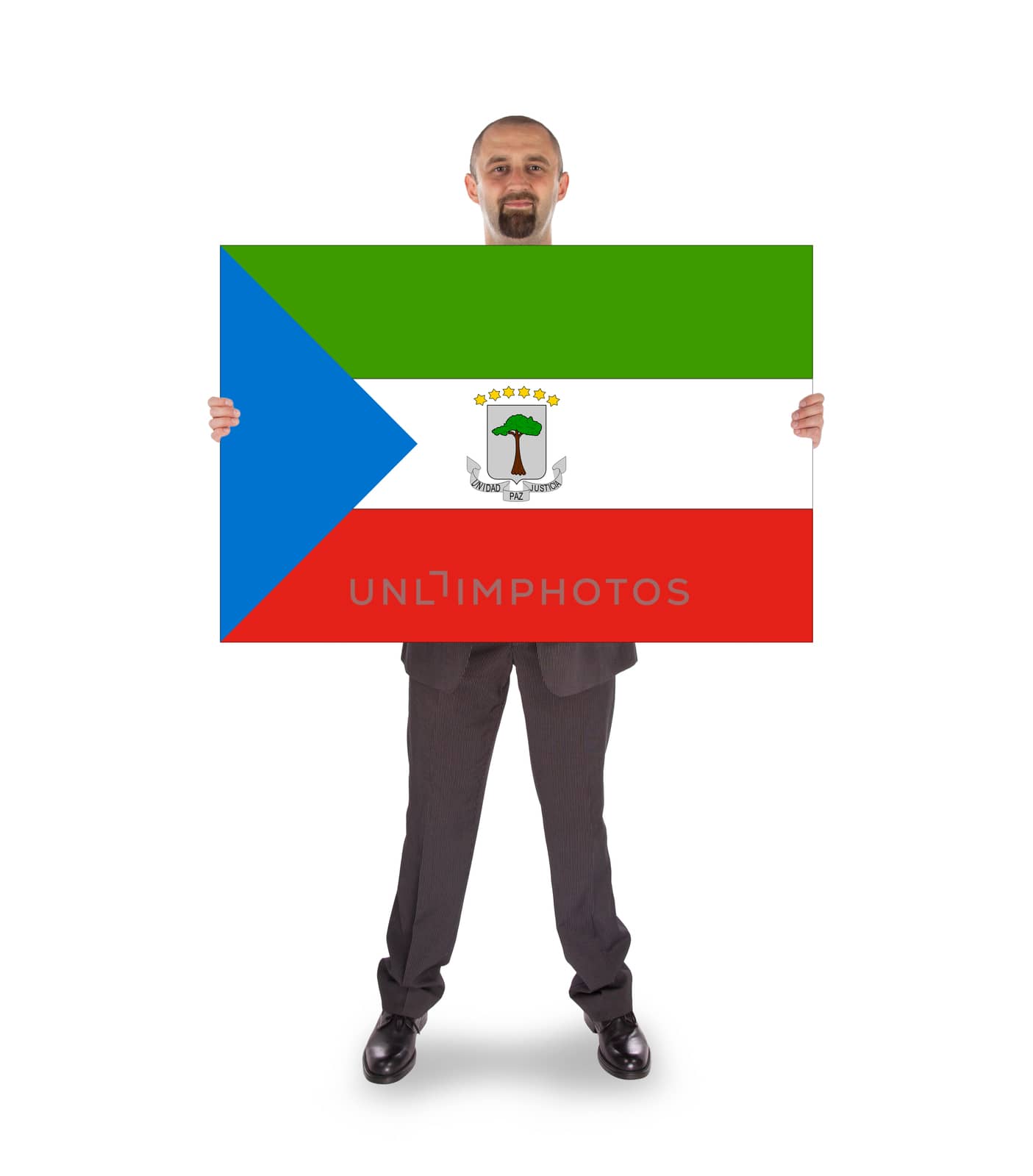 Smiling businessman holding a big card, flag of Equatorial Guinea