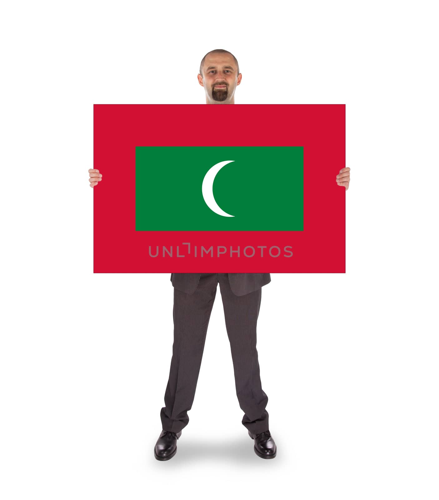 Smiling businessman holding a big card, flag of Maldives