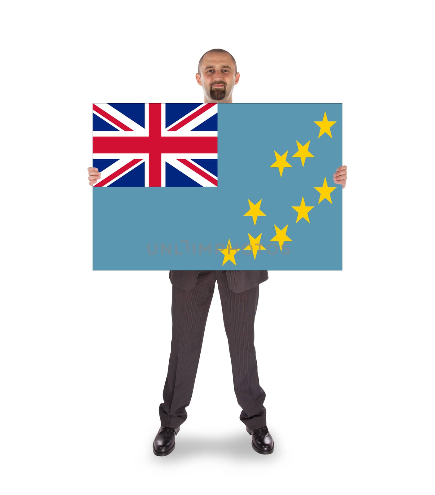 Smiling businessman holding a big card, flag of Tuvalu