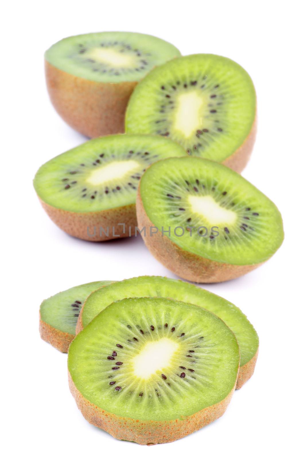 Perfect Ripe Kiwi Halves and Slices isolated on white background