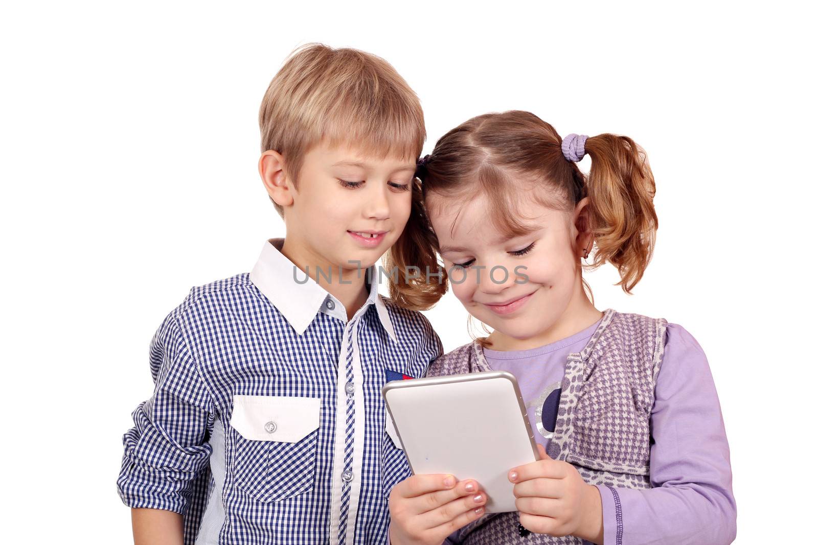 children play with tablet pc by goce