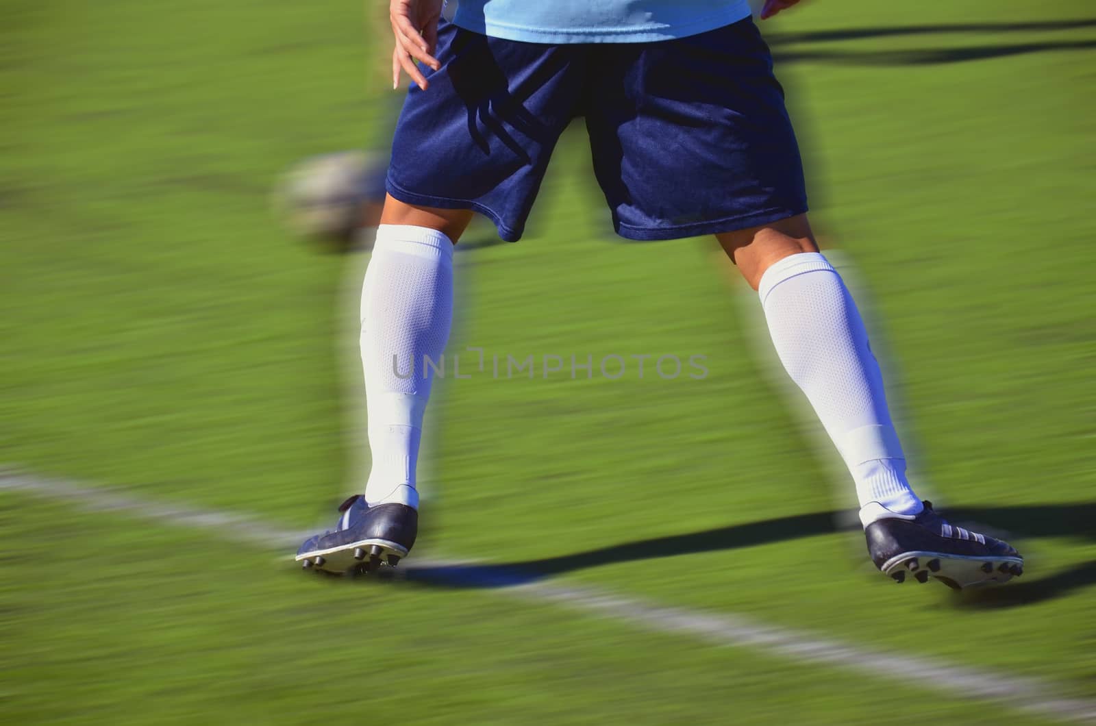 Soccer player waiting for ball