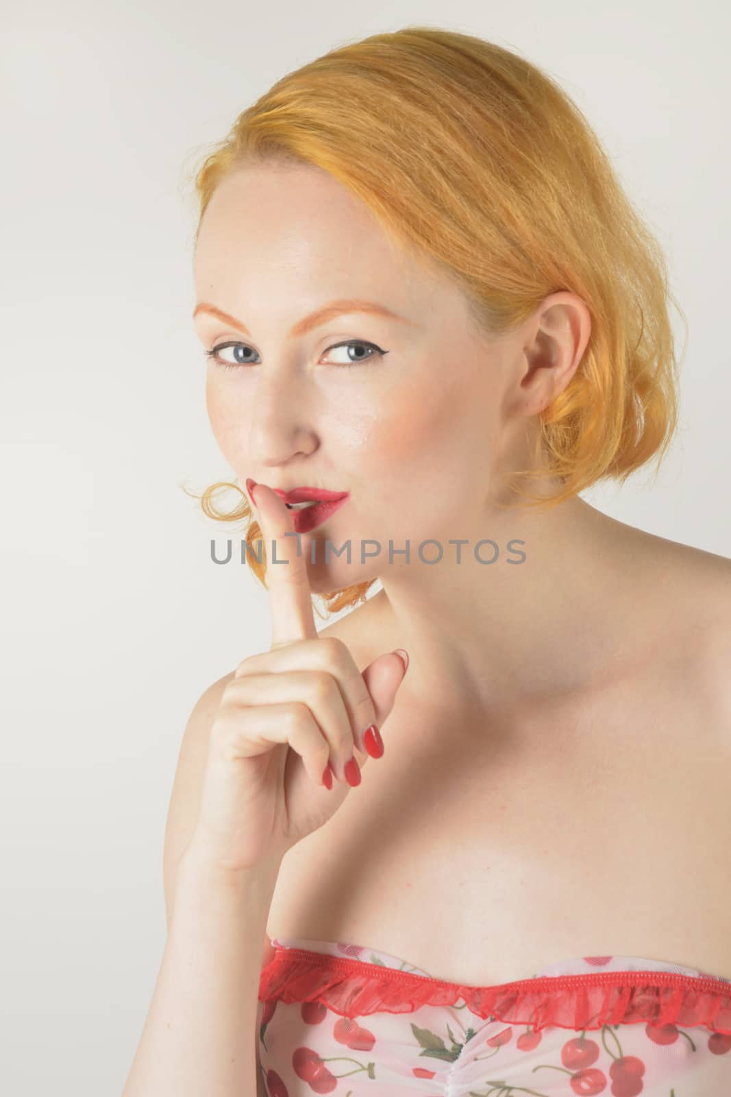 Red head with quiet expression