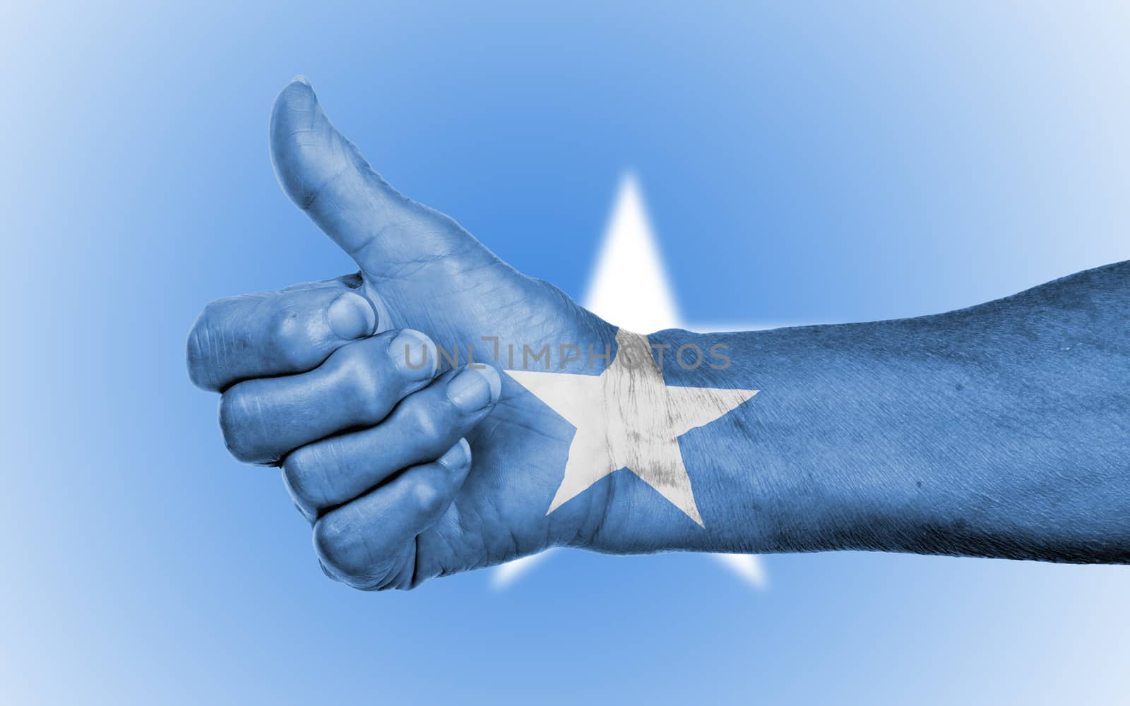 Old woman giving the thumbs up sign, isolated, flag of Somalia