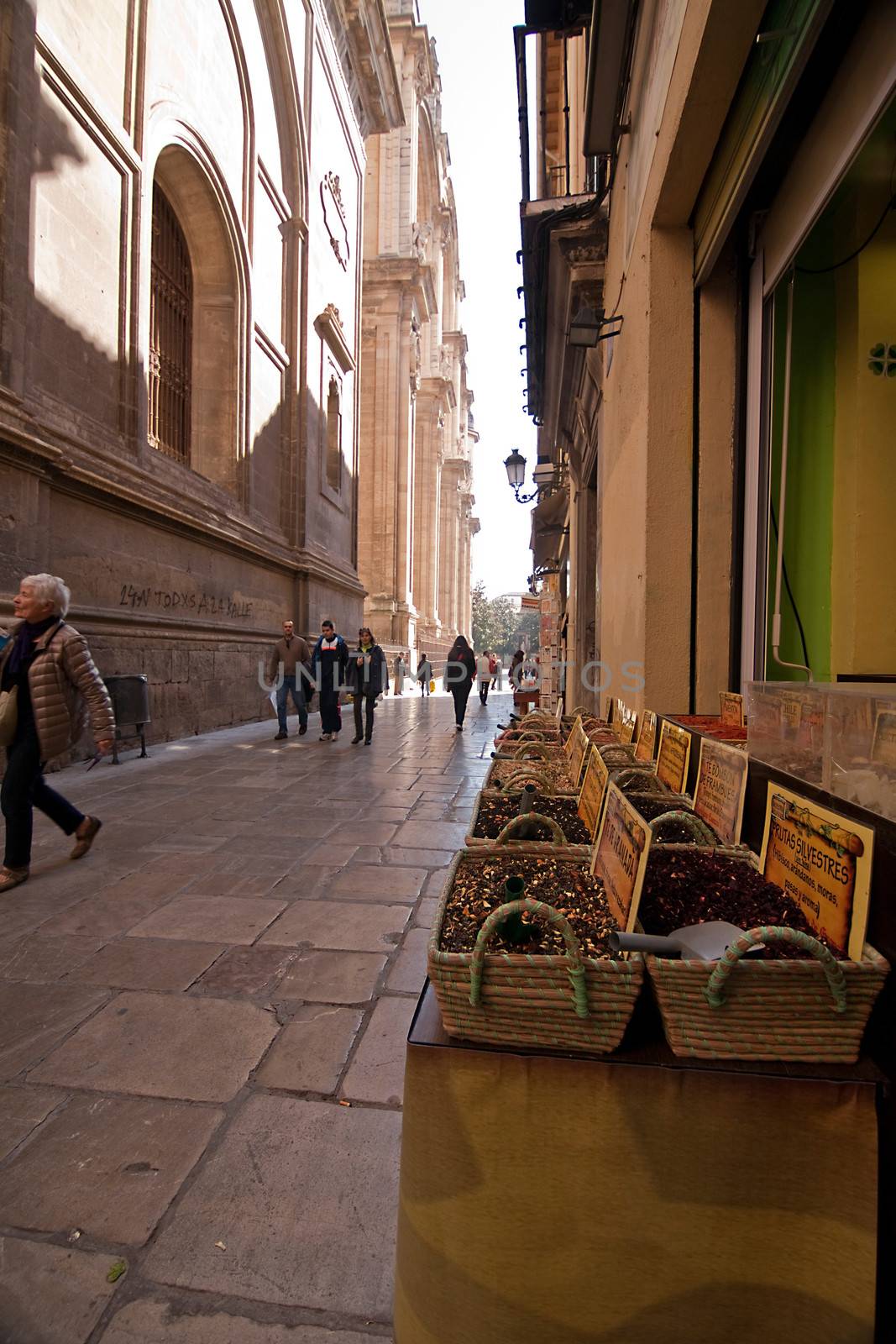 Market spices at the foot of the Tower of the Cathedral of Granada, Spain