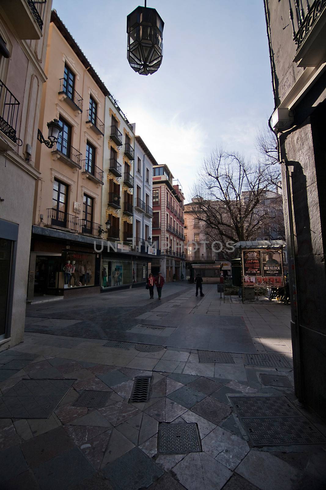 Access to bibarrambla square for salamanca street on mid afternoon. Granada, Spain