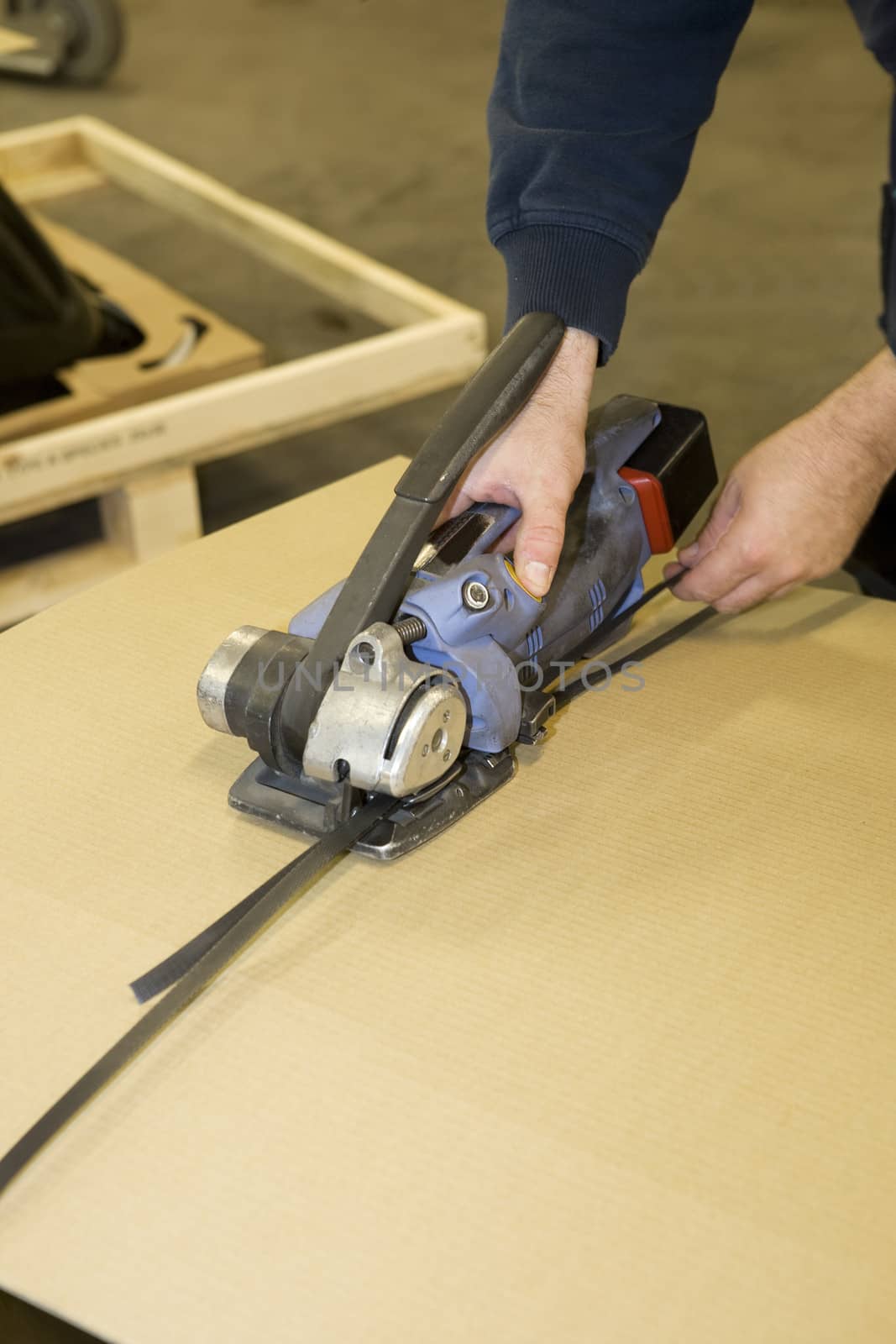 Close up of a man with industrial machine