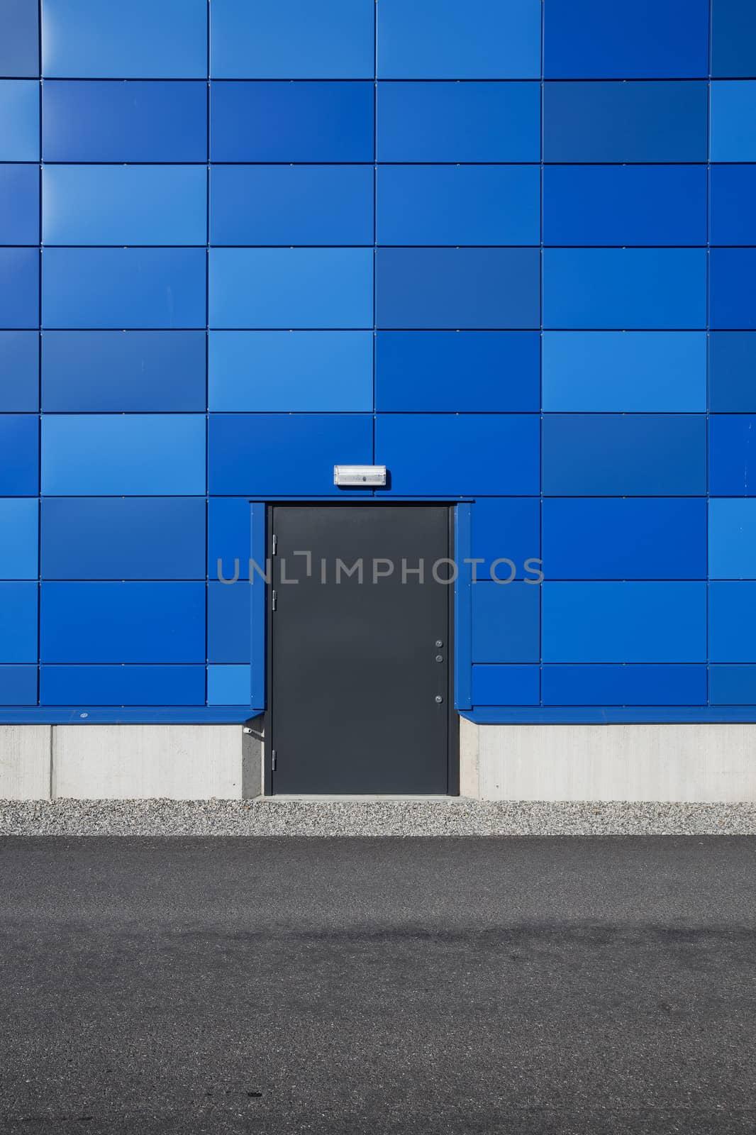 Locked door on blue wall