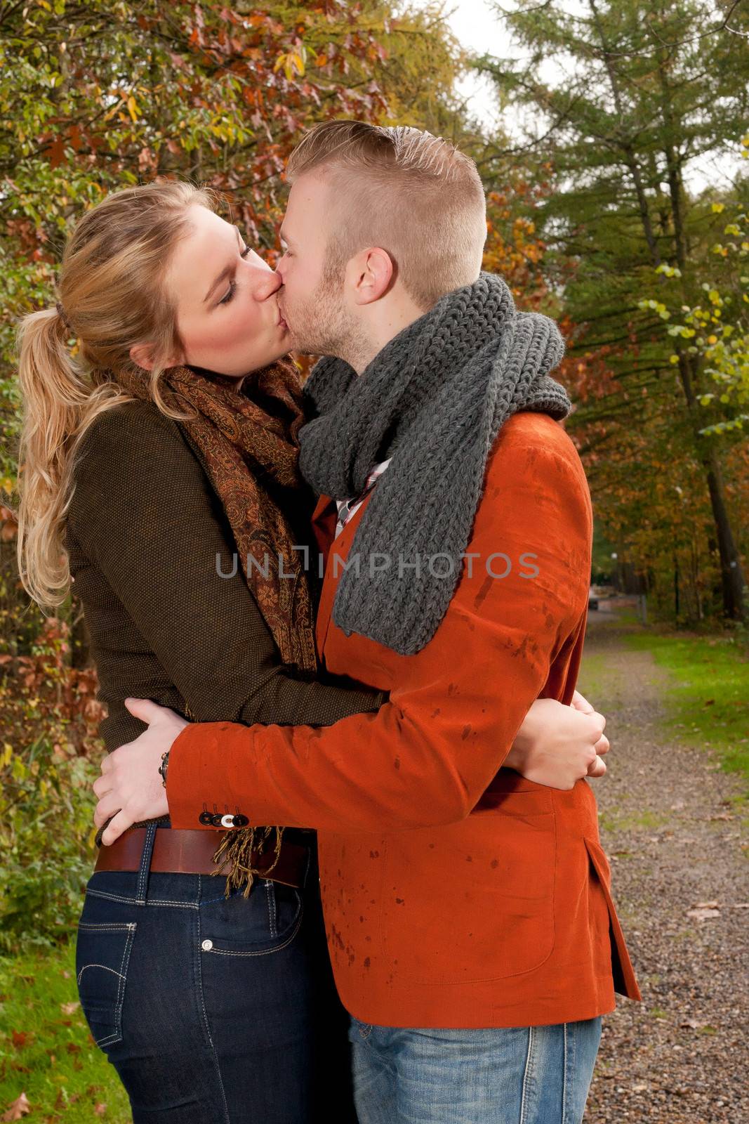 Happy young couple is having a nice time in october