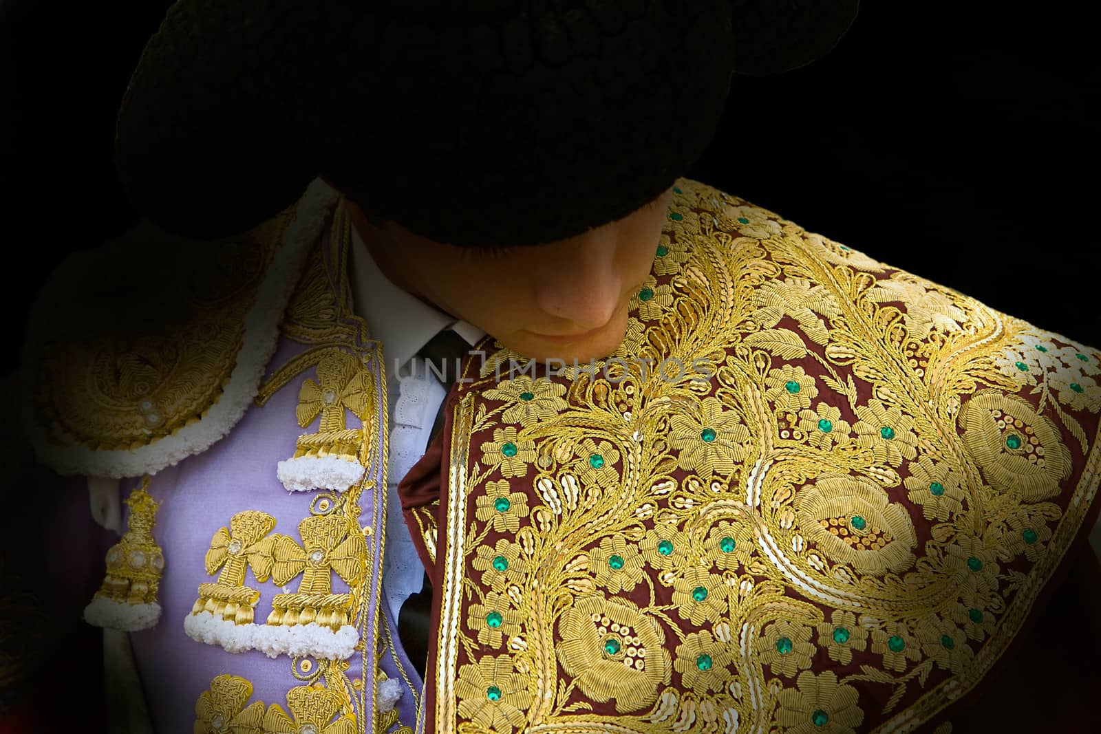 Bullfighter getting dressed for the paseillo or initial parade. Taken at Linares bullring before a bullfight, Linares, Spain, 15 august 2009