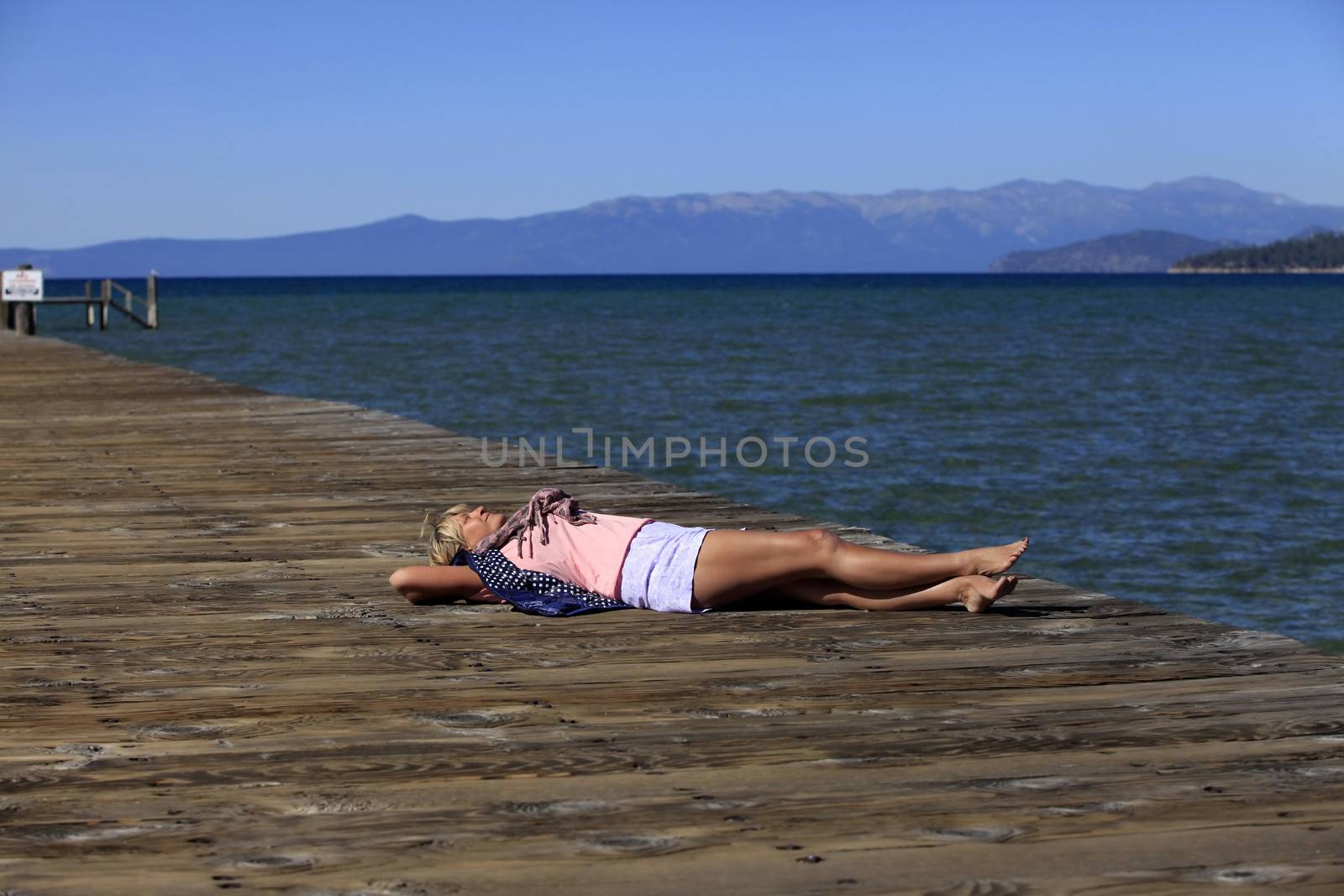 Adult woman on vacation at a lake Tahoe