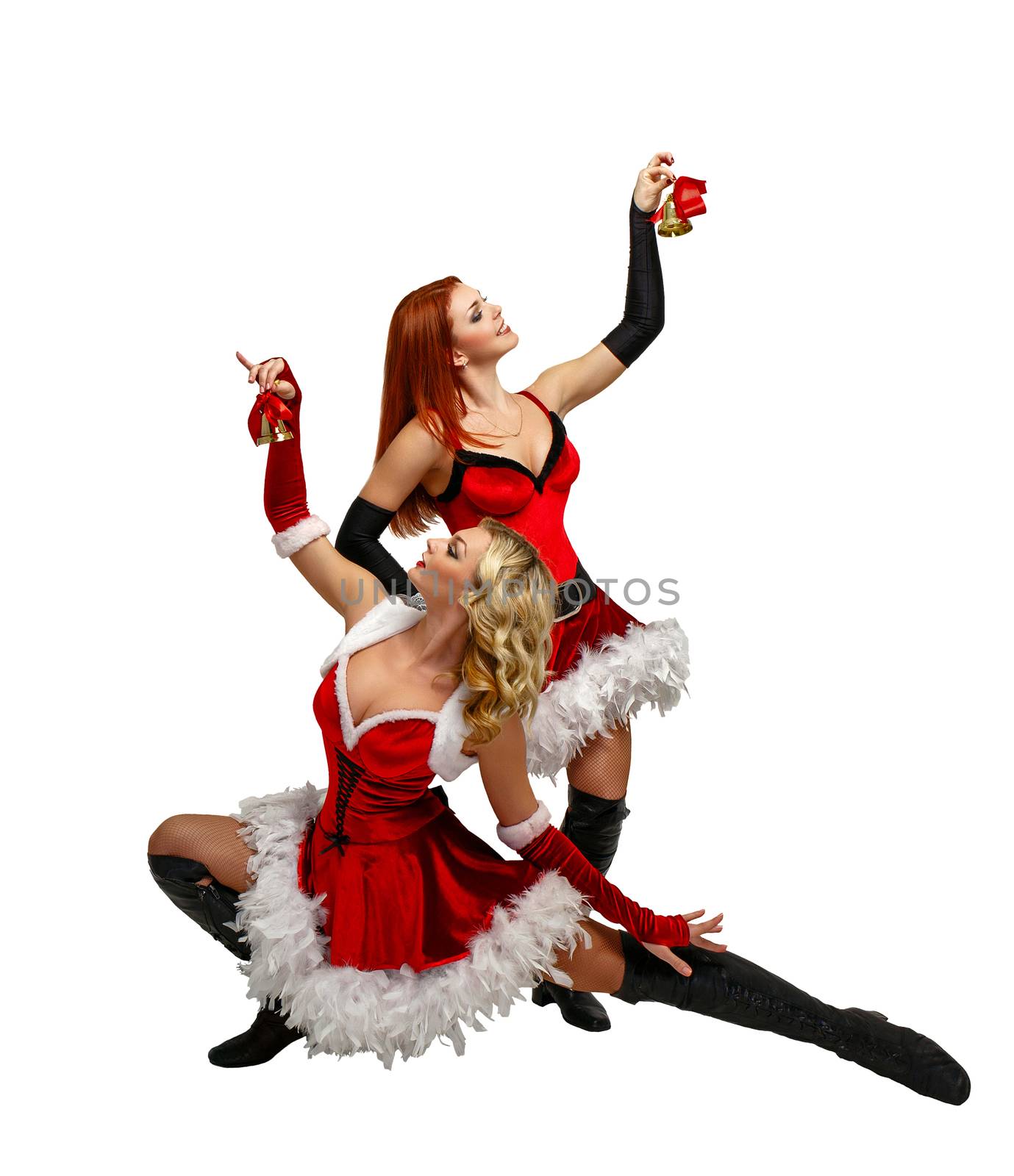 Attractive young women in carnival costumes and Christmas bells isolated on a white background