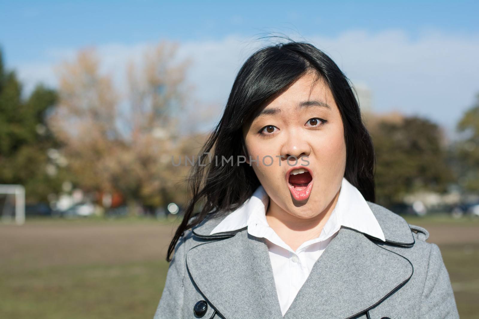 Surprised woman by IVYPHOTOS