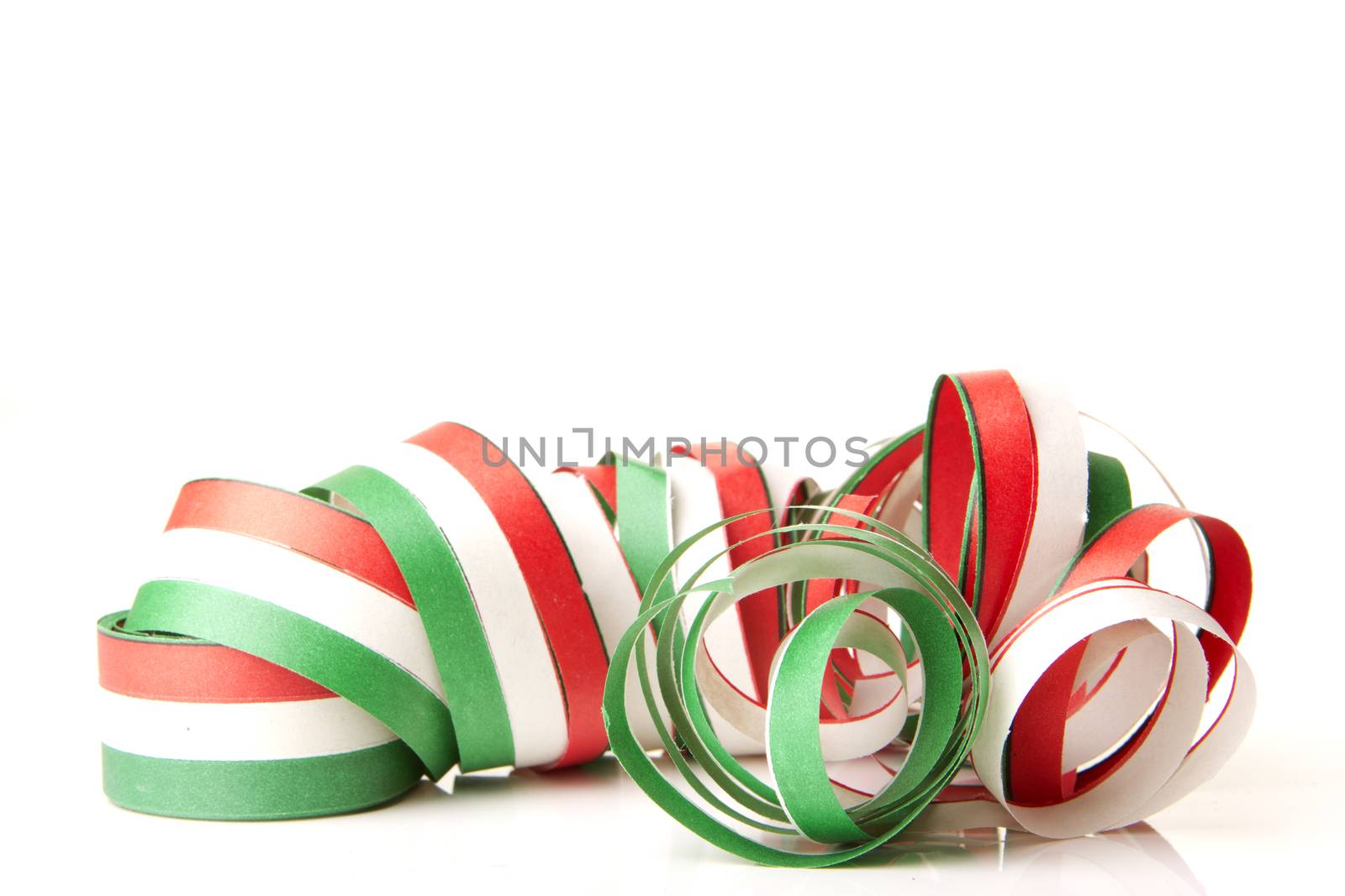 streamers and confetti as decoration for parties, sylvester with white background 