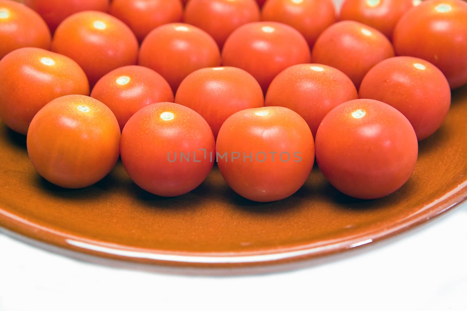 Cherry tomatoes on a ceramic bowl