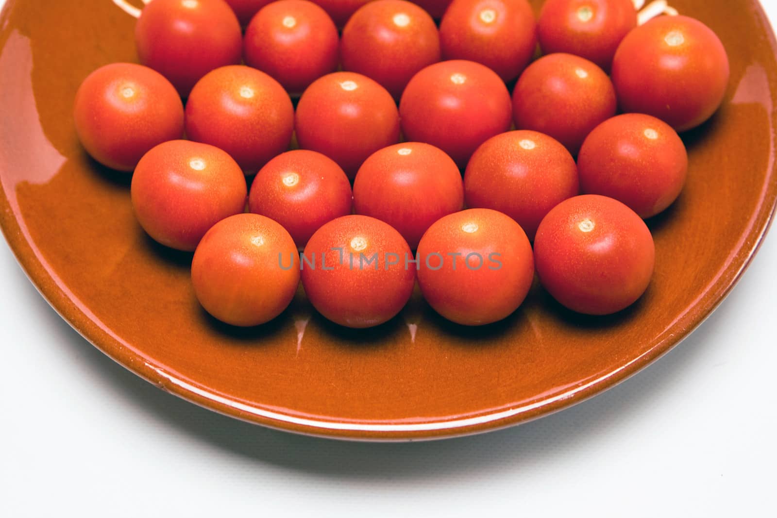 Cherry tomatoes on a ceramic bowl
