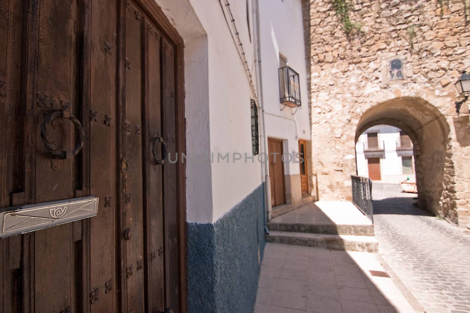 Street and Mudejar door of Sabiote, Jaen province, Andalusia, Spain