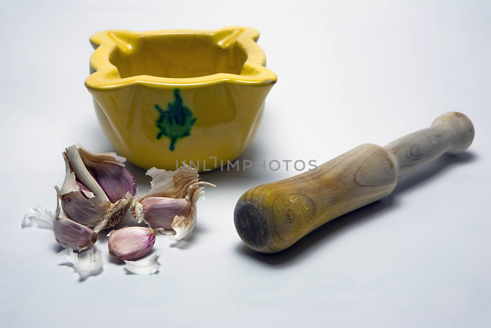   Ceramic mortar and garlic, used in the Spanish traditional kitchen, Spain
