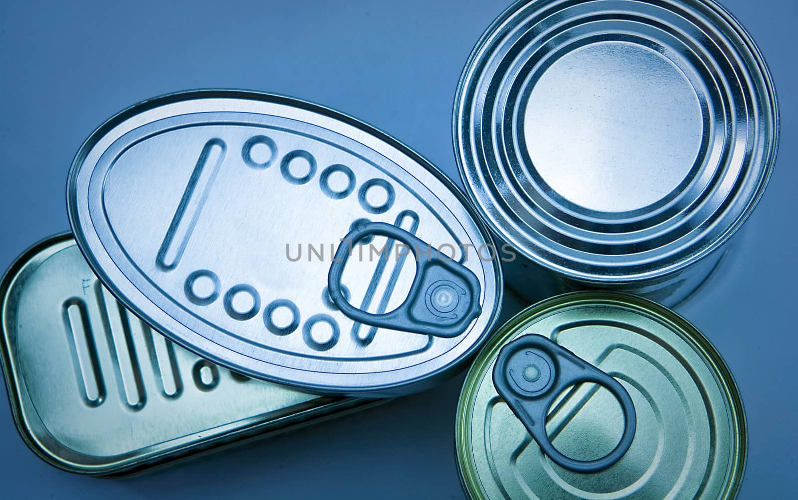 Tins of different sizes and opening