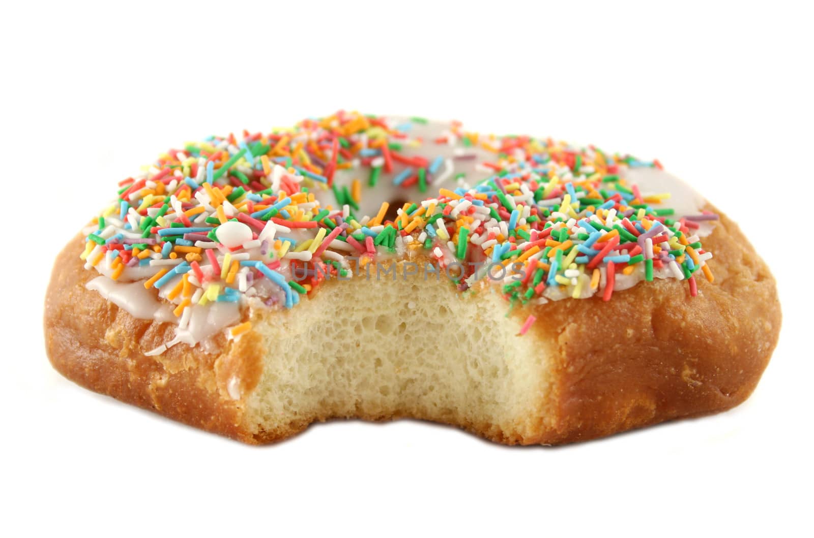 Sweet doughnut covered with colorful hundreds and thousands.